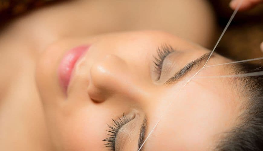إزالة الشعر بالخيط
